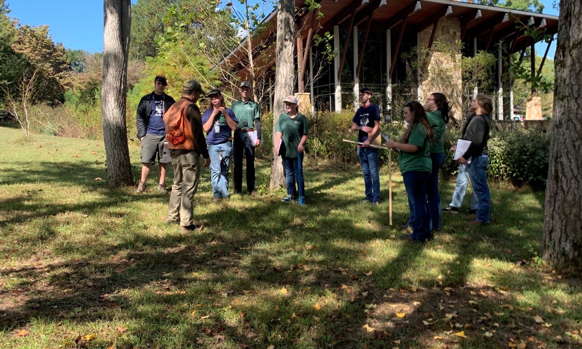 4-H students gather in group for forestry competition.