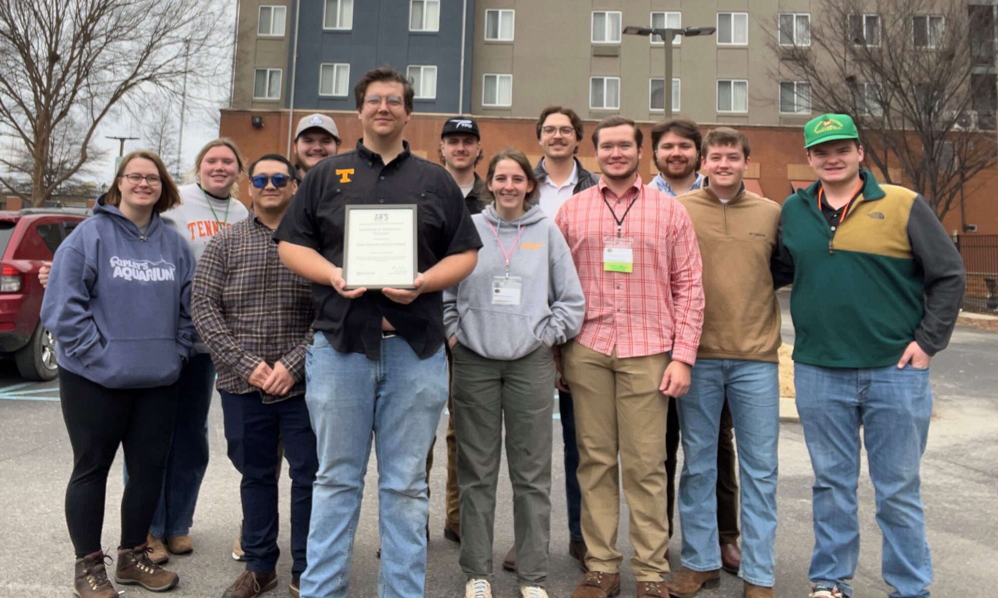The UTK Wildlife and Fisheries Society post with an award at the Southern Division of the American Fisheries Society Annual Meeting.