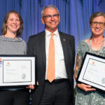 Emma Willcox, professor in the School of Natural Resources, (right) received the James R. Cox Professorship along with Katherine Ambroziak, associate professor of architecture, (left) from UT Provost John Zomchick (middle) at the UT Academic Honors Banquet on May 1.