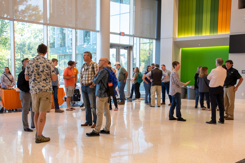 Dozens of people in a building on the UT Institute of Agriculture campus.