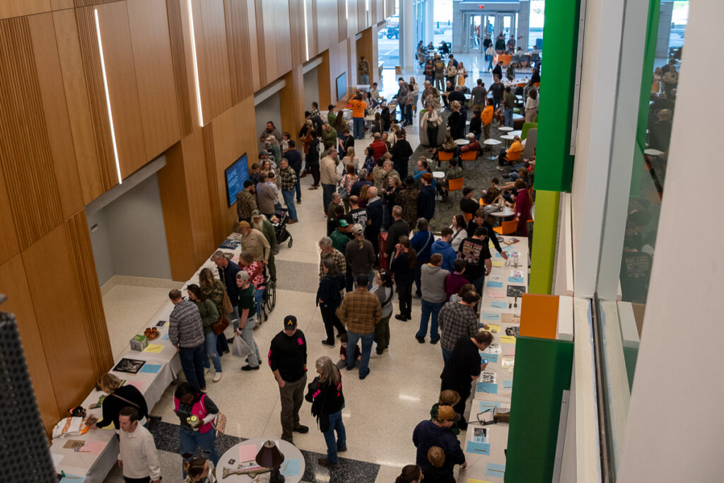 People gather in a building on the UT Institute of Agriculture campus.