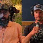 Person on right of image wearing headphones and a cap while holding a microphone in front of a wall, and the person on the left wearing a cap and headphones with an image of a hunting dog behind him.