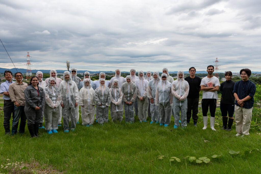 Students wear PPE on the Nagoya University farm.