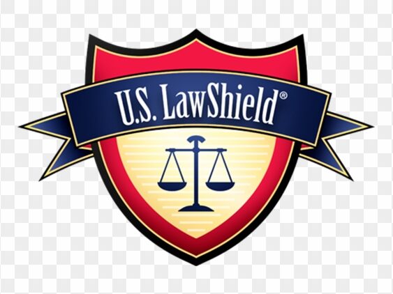 Red shield and blue ribbon with U.S. Law Shield over it and a graphic of scales.